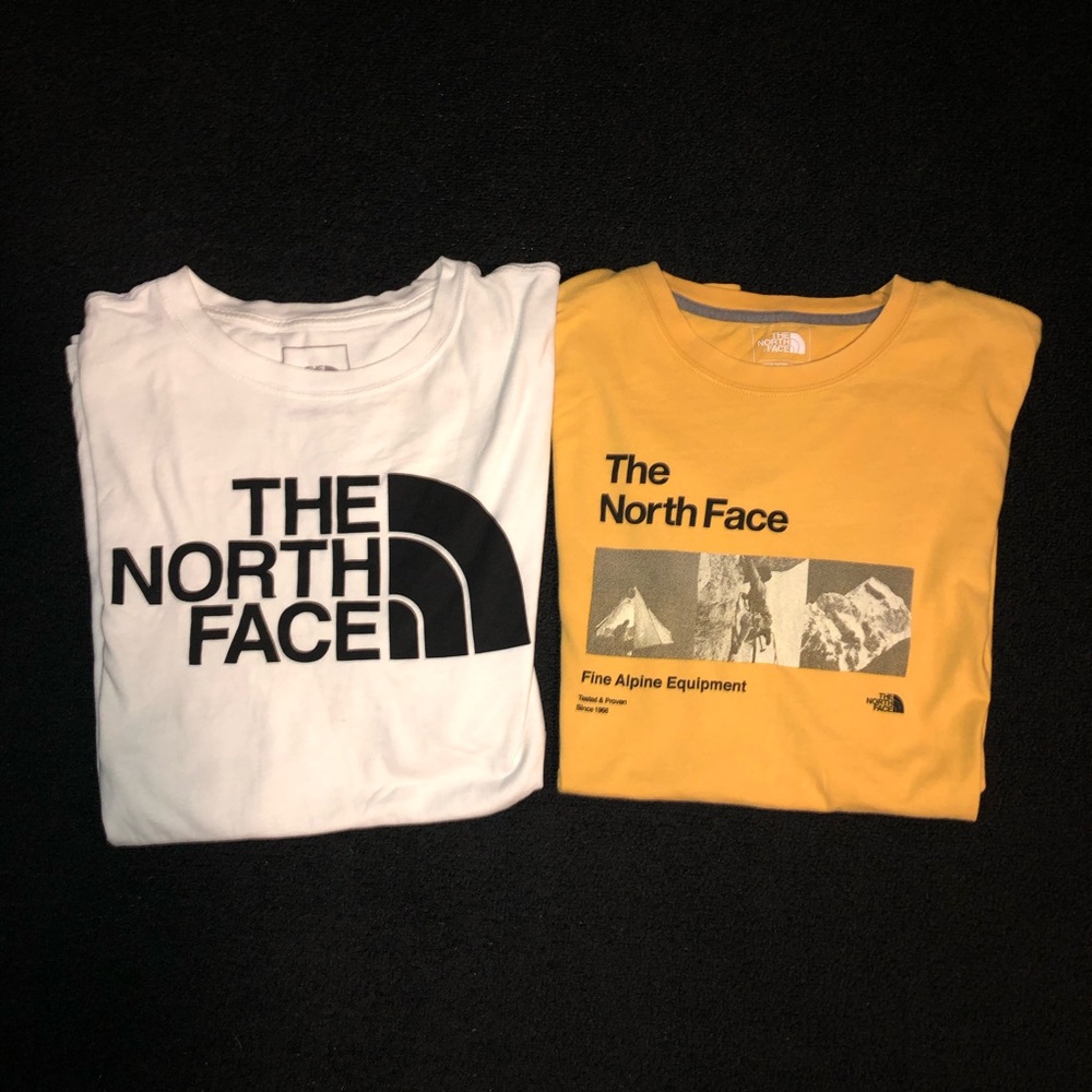 The North Face. 2 Shirts. Size Large. White & Yellow color.
